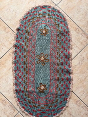 Handmade knitted rug used