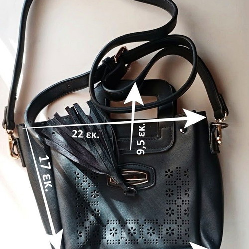 Black Women's Shoulder Bag like new with laser-cut patterns and tassels