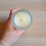 White candle in container new
