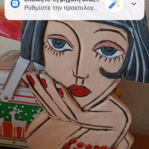 Handmade clay tabletop girl sculpture
