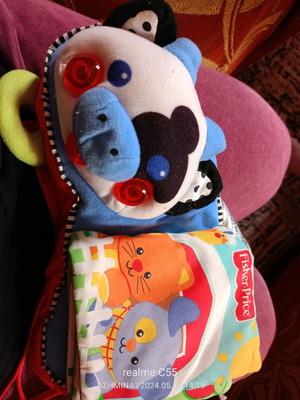 Cow toy for stroller or vintage rattle with sounds and textures