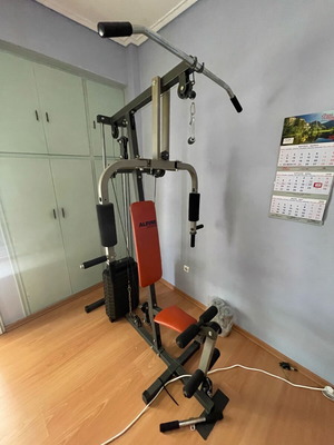Alpine G41 fitness machine used with 3 handles and adjustable weights