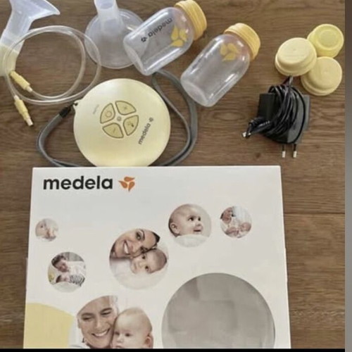 Medela Swing Flex breast pump with storage bags like new