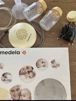 Medela Swing Flex breast pump with storage bags like new