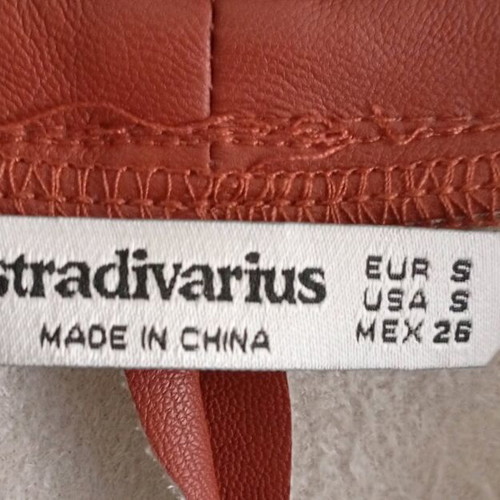 Stradivarius leatherette top new, orange, small with shoulder pads