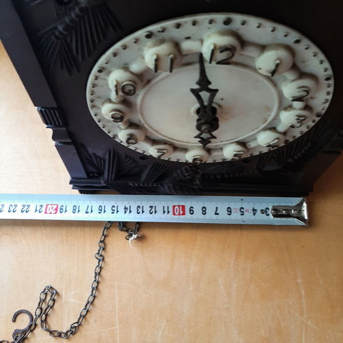 Vintage cuckoo clock used with pinecone weights