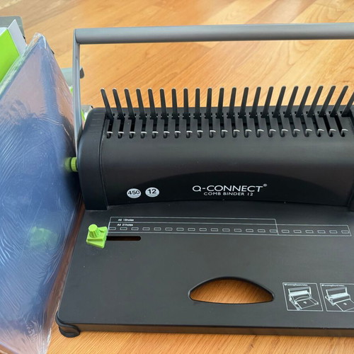 Comb Binder 12 binding machine like new with 8 packs of spirals and covers