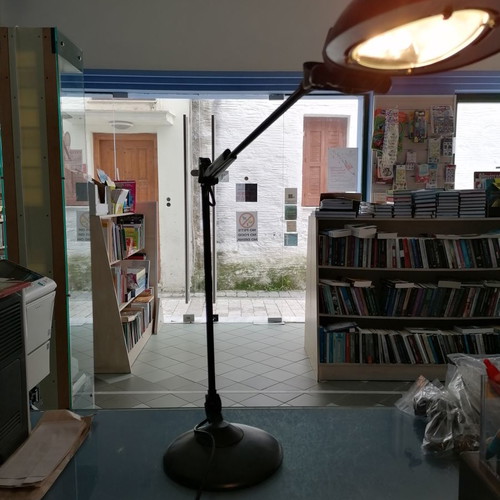 Desk lamp with arm new with small crack on base