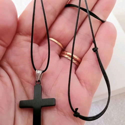 Double-sided cross with black adjustable cord like new, stainless steel