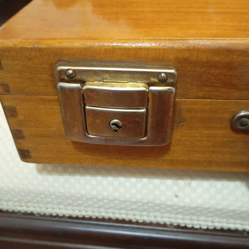 Vintage wooden suitcase made of genuine teak wood, used