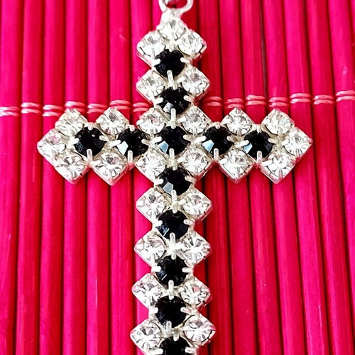 Cross used with white and black rhinestones