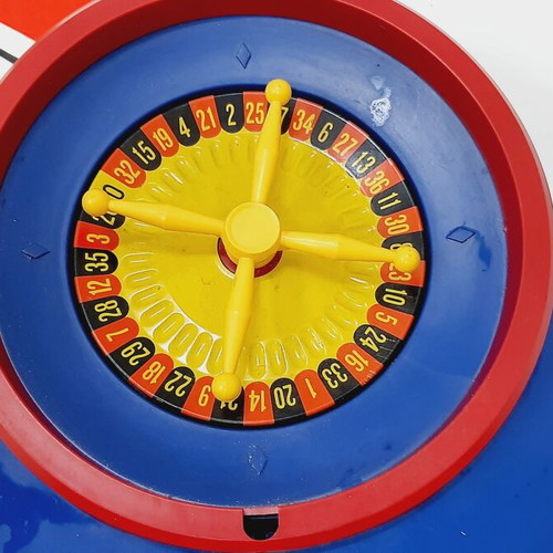 Vintage children's roulette game, like new, blue plastic, nylon mat