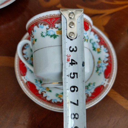 Set of 4 cups with saucers like new