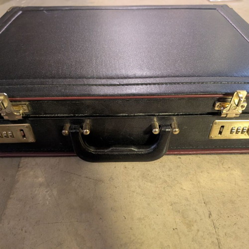 Briefcase used with double combination locks black