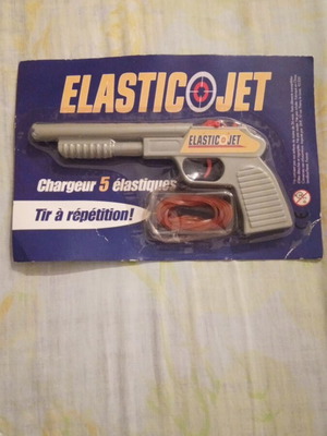 Elasticojet plastic rubber band shooter toy, 1980s sealed