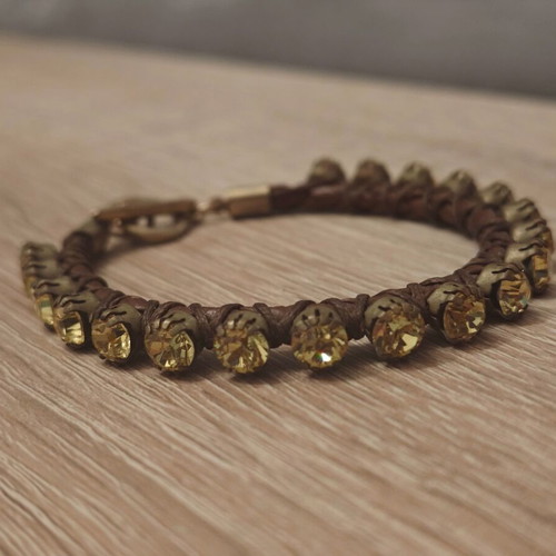 Bracelet brown with yellow strass