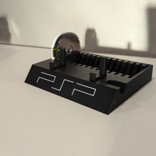 Sony PSP stand for console and discs like new