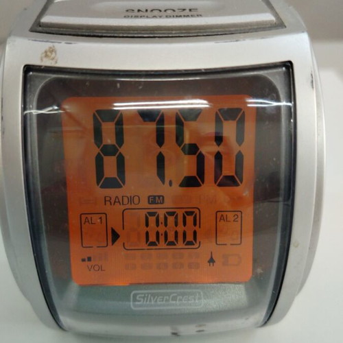 Portable radio with alarm clock like new, gray
