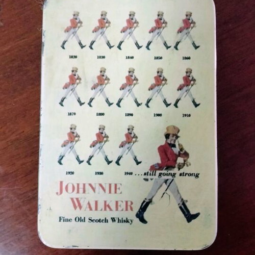 Johnnie Walker collectible playing cards laminated in metal box like new