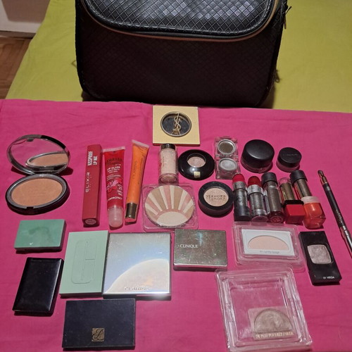 Large collection of branded cosmetics with YSL mirror and makeup bag
