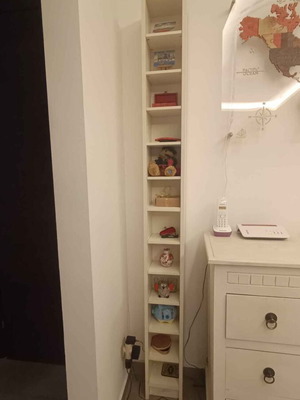 Wooden CD tower shelf used, narrow and tall