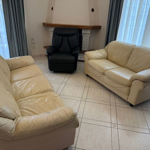 Two-seater sofa used beige leatherette with free three-seater sofa