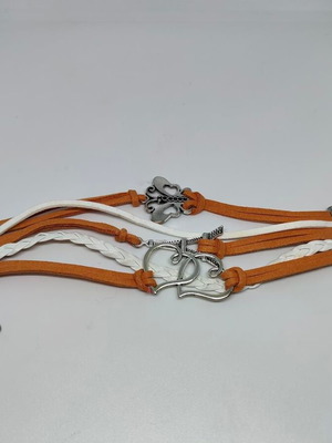 Handmade multilayer bracelet with leather cords and metal heart and butterfly elements like new