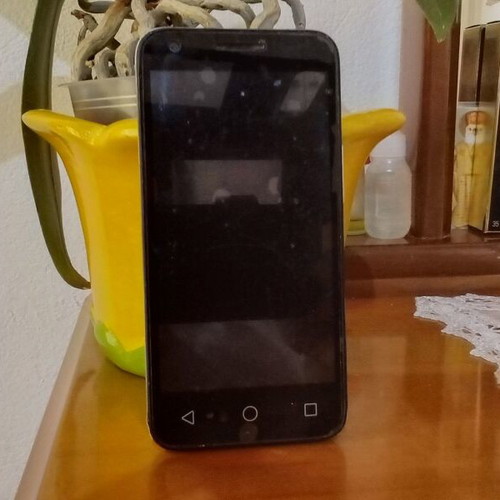 Vodafone smartphone used, tin can with wire category