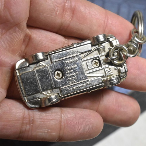 Vintage Ferrari Shell keychain used with metal car collectible
