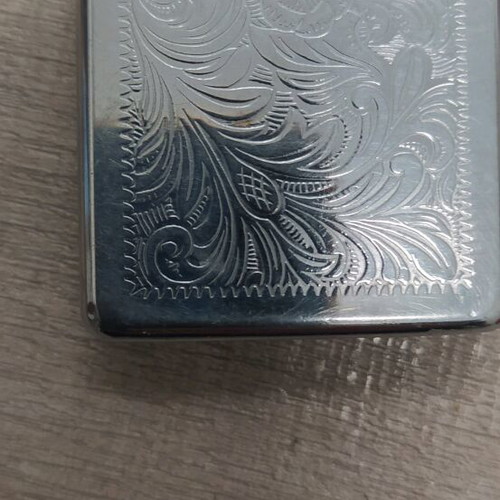Zippo lighter used with small dent