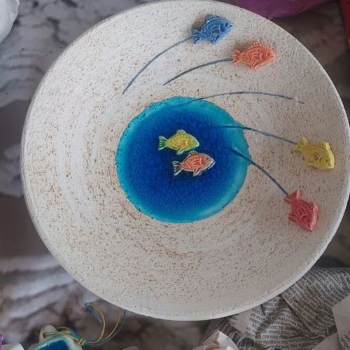 Decorative ceramic platter with colorful fish design, new