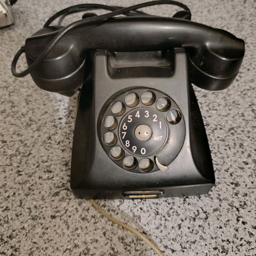 Vintage telephone used, black bakelite with rotary dial