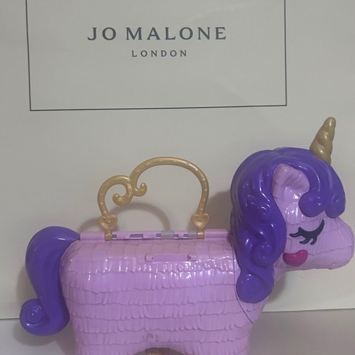 Polly Pocket Unicorn Party Playset used by Mattel
