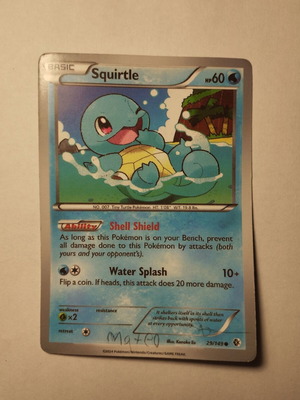 Pokemon Squirtle card used with water type and marked pen