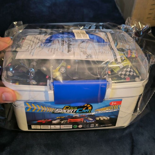 Toy cars brand new, pack of 50 with carrying case