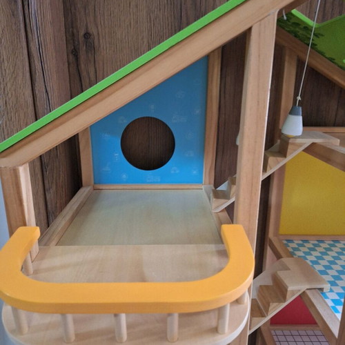 Hape wooden dollhouse like new