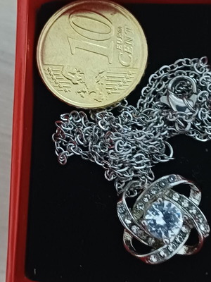 Silver necklace like new with chain length about 56cm