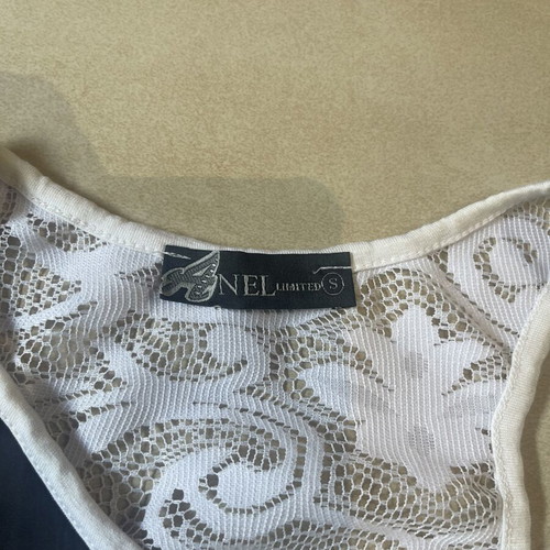Anel sleeveless shirt with leopard print and lace back like new, size M