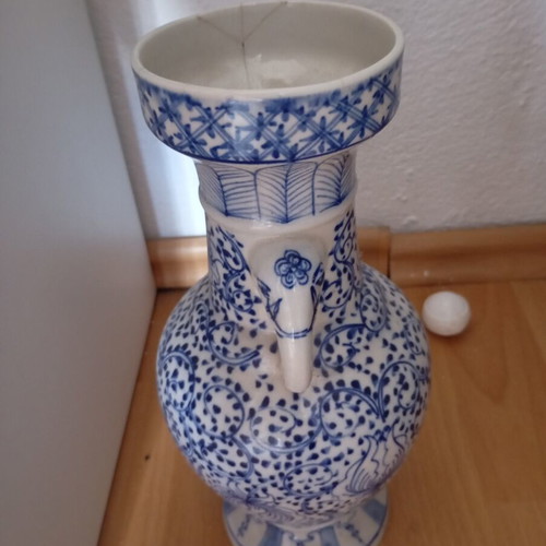 Vintage porcelain vase used, traditional Asian style blue and white Ming Qing design
