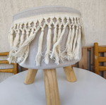 Wooden stool with macrame design