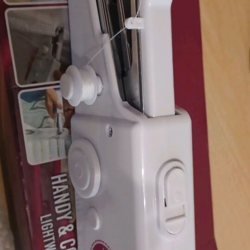 Handheld sewing machine like new