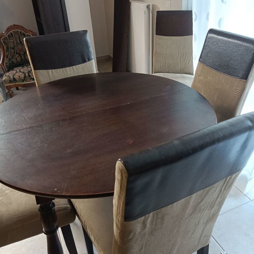 Round extendable dining set used with 6 alkadara chairs
