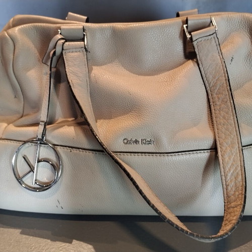 Calvin Klein beige handbag used with ample storage space