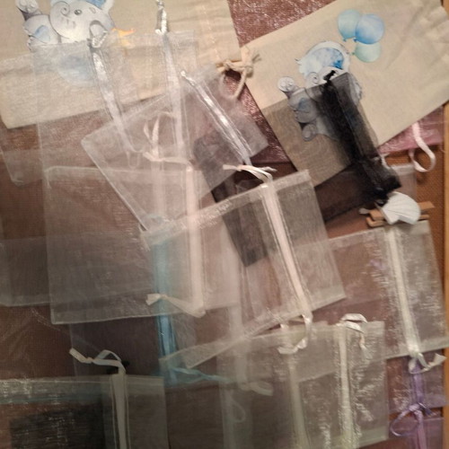 Pouches like new, pack of 32, various designs and sizes