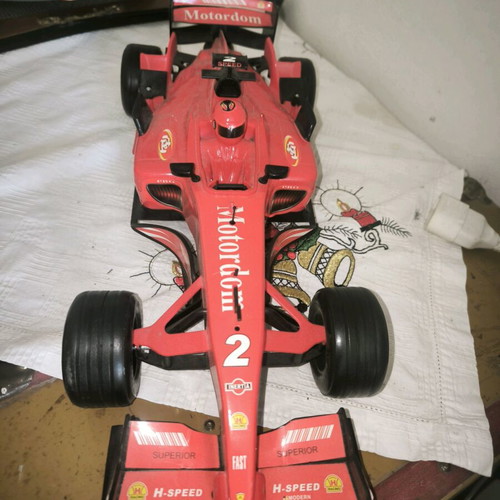 Formula 1 toy car with friction and sounds, red, like new
