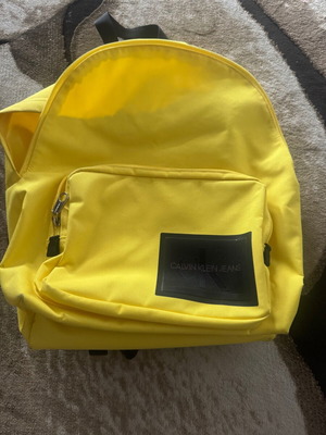 Calvin backpack used, yellow shoulder bag