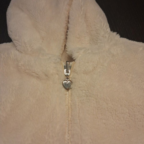 Reversible fur jacket with hood and pockets