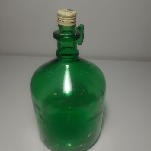 Boutatis bottle vintage glass used