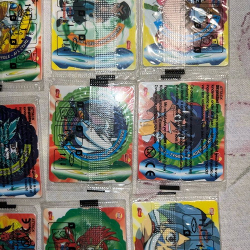 Beyblade 14 new sealed with small cut on two
