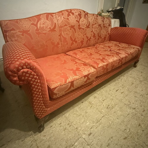 Vintage 1960s sofa with floral upholstery and carved wooden legs